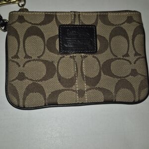 Coach Wrislet  Brown Leather Trim with Tattersall on interior lining EUC.